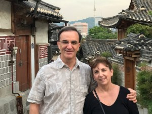 Jill and her husband Kyle. Kyle has his arm around her shoulder.